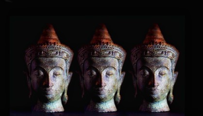 Three Buddha Heads