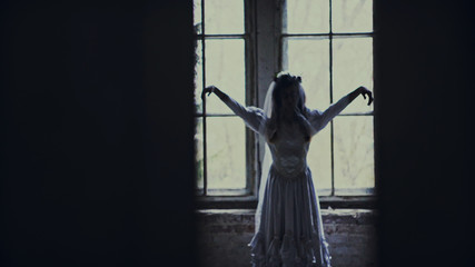 Halloween day with creepy zombie bride