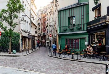  Cozy street with tables of cafe in Paris, France © Ekaterina Belova