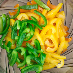 Sliced pepper. Slices of yellow and green bell peppers