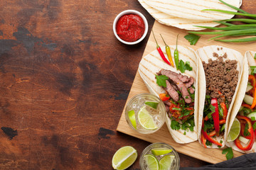 Mexican tacos and caipirinha cocktail