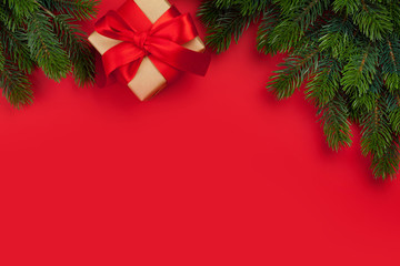 Christmas card with gift box and fir tree branch