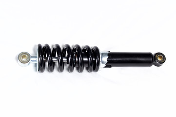 a brand new clean black and silver motorcycle shock absorber over white, this shock is also used on...