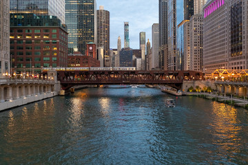 Fototapeta na wymiar Chicago downtown evening skyline river bridge buildings