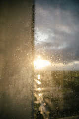 drops of water on windows glass and sun