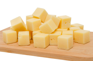 Käse Würfel auf Holzbrett