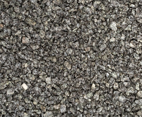 Vue gros plan d'une texture de pierre et gravier gris clair et gris foncé