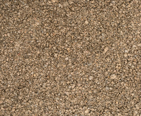 Vue gros plan d'une texture de pierre, gravier et sable marron