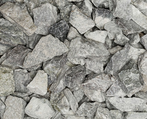 Vue gros plan d'une texture de pierre et rocher gris clair et foncé