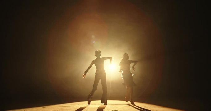 Two little asian ballroom dancers performing some latin dance. Young talented choreographers showing art - childhood dream, childhood memories concept 4k footage