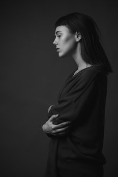 Young woman in profile. Black and white