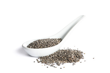 Chia seeds in porcelain spoon isolated on white background