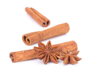 Spicy Cinnamon Sticks and Anise isolated on White background closeup macro shot