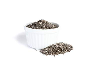 Chia seeds and sauce boat isolated on white background