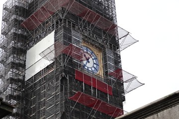 Brexit concept image consisting of the Big Ben clock tower undergoing renovation. 