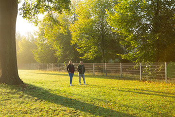 Couple of farmers make their first walk of the day very early in the morning.