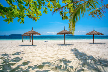 Umbrella wooden on tropical beach.