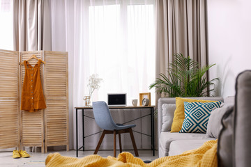 Modern living room interior with comfortable couch