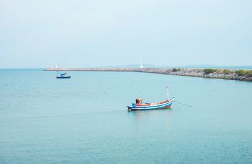 Fototapeta na wymiar Man on fishing boat in the sea