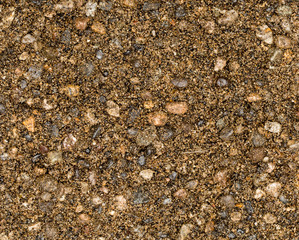 Vue gros plan d'une texture de pierre, gravier et sable fin orange et marron