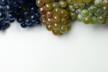 Fresh ripe juicy grapes on white background, top view