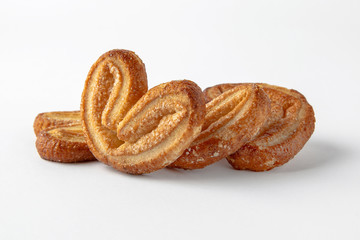 Tasty crunchy cookie: oatmeal, shortbread, chocolate, nutty, honey. Close-up isolated on a white background