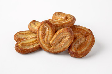 Tasty crunchy cookie: oatmeal, shortbread, chocolate, nutty, honey. Close-up isolated on a white background