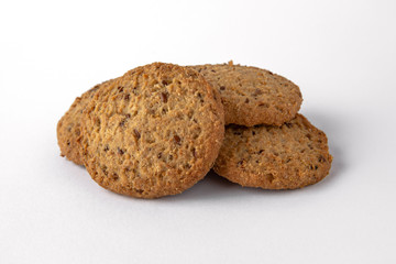 Tasty crunchy salty and spicy cookies: oatmeal, shortbread. Beer snack. Close-up isolated on a white background