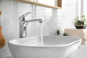 Stylish white sink in modern bathroom interior