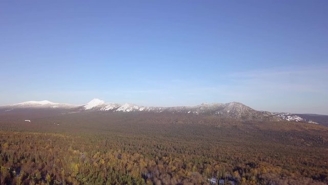 Taganay Mountain Ridge Peak Covered with Snow. Winter in Taganay National Park in the Urals, Russia. Aerial View