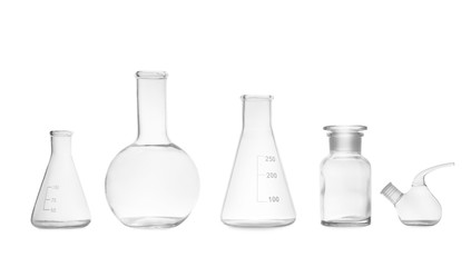 Set of empty laboratory glassware on white background