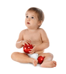 Cute little baby with Christmas decorations on white background
