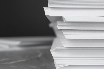 Stack of blank white paper on table, closeup. Space for text