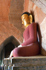 Buddha statue inside ancient pagoda in Bagan, Mandalay division of Myanmar
