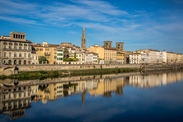 Fototapeta na wymiar Embankment of the Arno river in Florence on an autumn morning. Florence, Tuscany, Italy