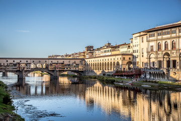 Fototapeta na wymiar View from the banks of the river Arno on the Ponte Vecchio, Florence, Italy