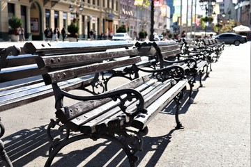 benches with cast-iron twisted arms and legs