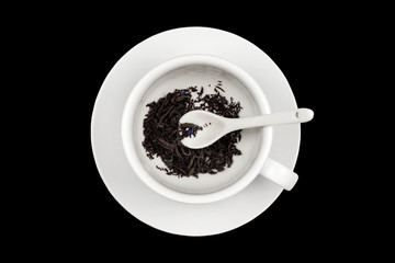 cup of dry tea, tea leaves, isolate on a white background