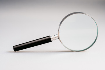 Magnifying Glass on Gray