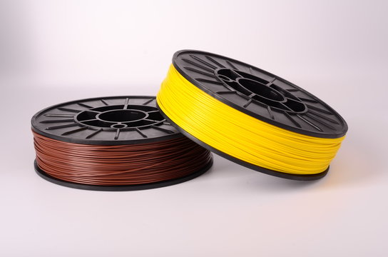 Filament for 3D Printer crystal clear and bright against a bright background.
