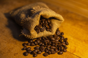 roasted coffee beans in jute bag