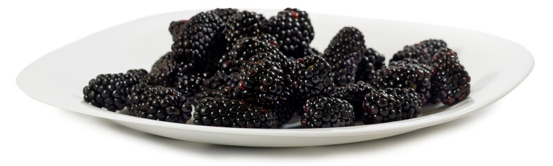 Isolated image of ripe blackberry on white background closeup