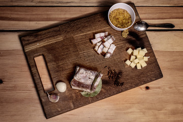 raw pork salted bacon with garlic, mustard and cheese