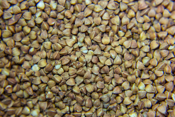 Background, texture, the rump. Buckwheat. Roasted buckwheat. Useful properties of buckwheat. Garnish. Ingredient, product, cook. Brown. Agribusiness, crop, organic farming. Dietary product.