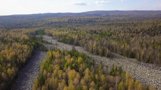 Taganay National Park in Russia in Autumn. Aerial View of "Big Stone River", Biggest Deposit Occurrence of Aventurine Quartz