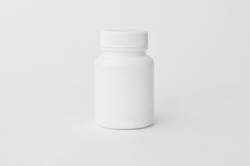 White medical container on white background