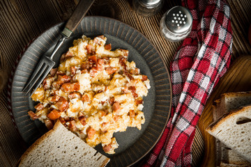 Scrambled eggs with sausage.