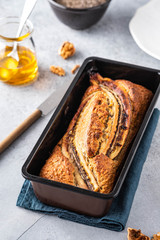 Banana bread on light concrete background. Copy space.
