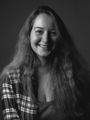 Portrait of laughing happy young woman. Black and white