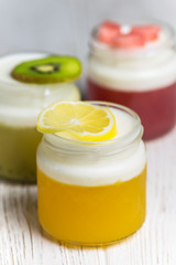 homemade jelly made from natural juices of orange, watermelon and kiwi, milk